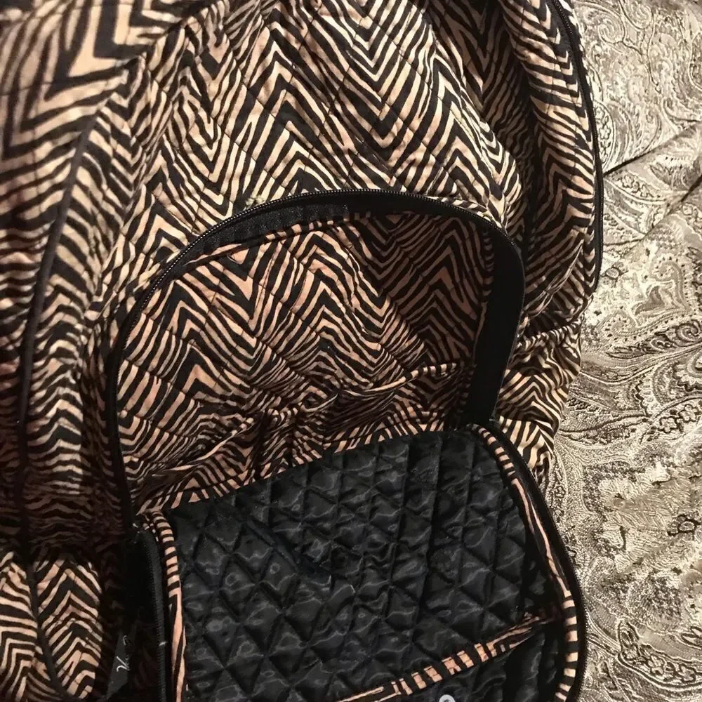 Vera Bradley school backpack excellent  condition  Black and Tan zebra print